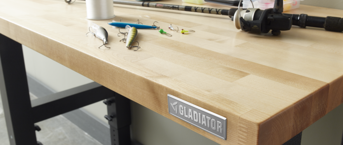 A close-up of the Gladiator brand logo on a Gladiator brand worktable.