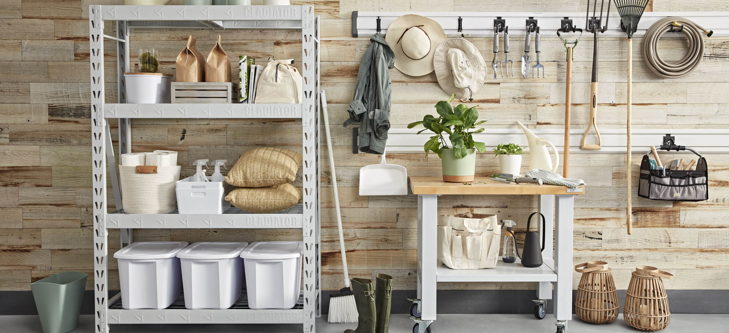 A Gladiator brand wall storage unit with various gardening and farming equipment.